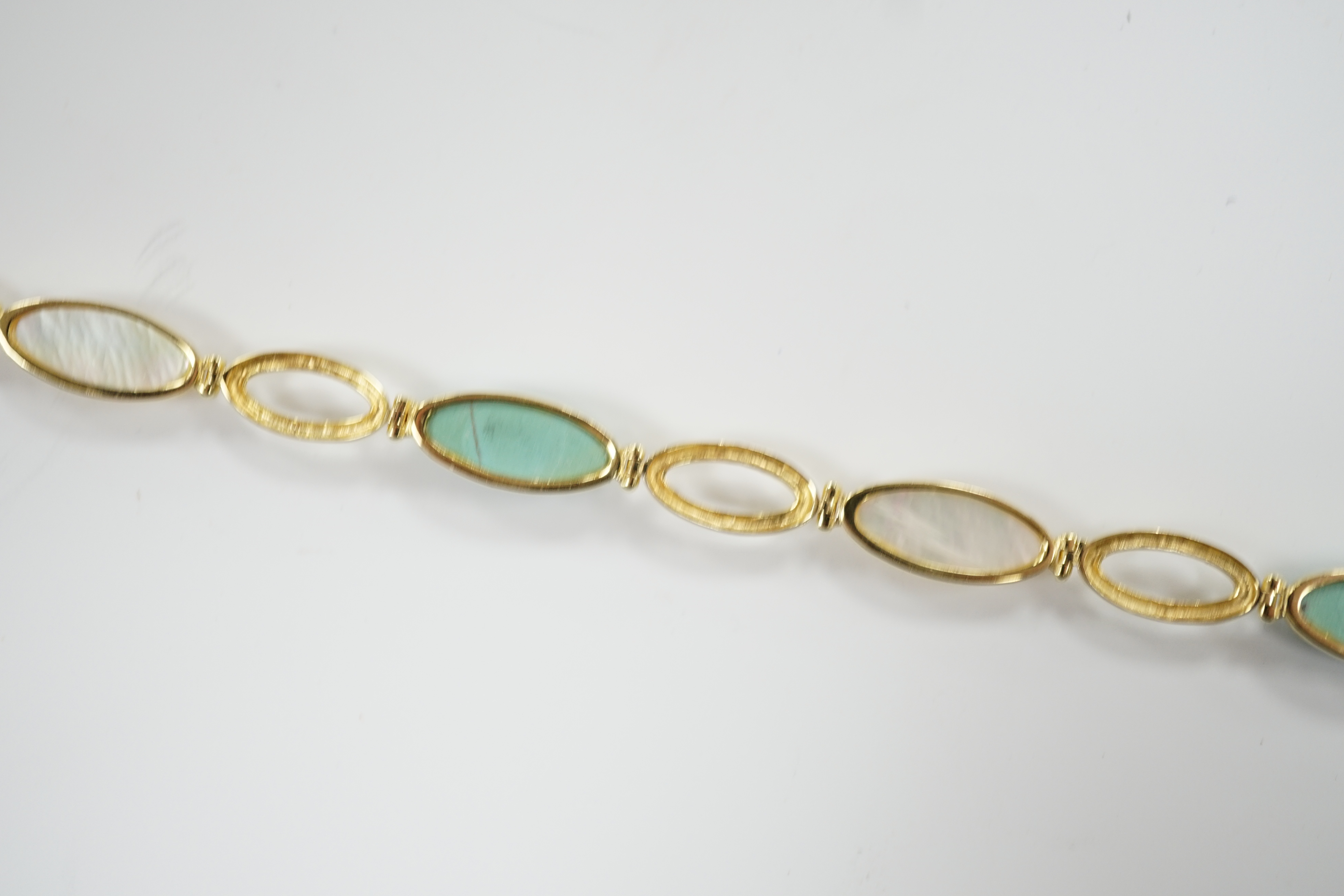 A modern 14k, mother of pearl and turquoise set bracelet, 18cm, gross weight 6.2 grams. moonstone and 14k bracelet